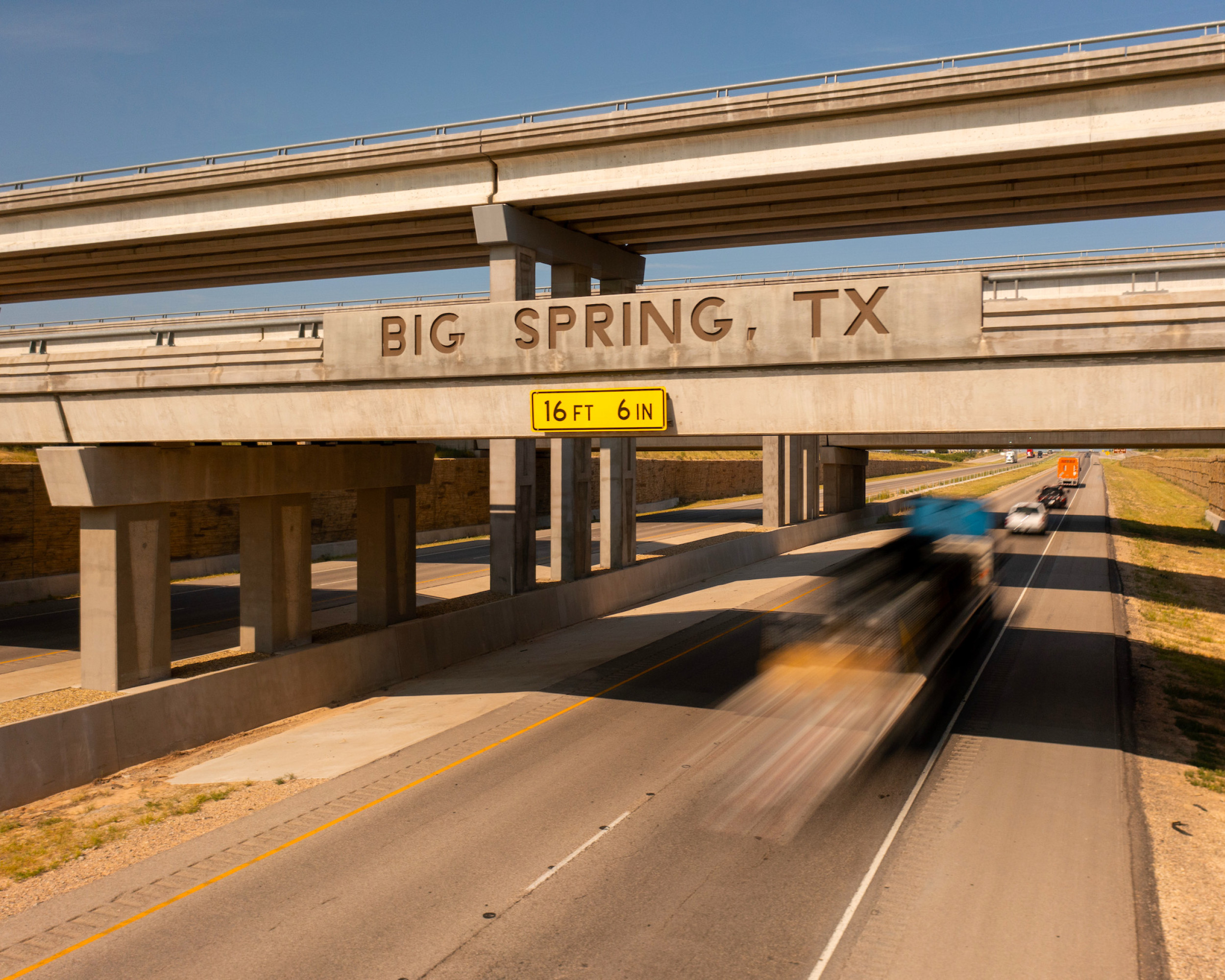 Big Spring sign of a bridge over a highway